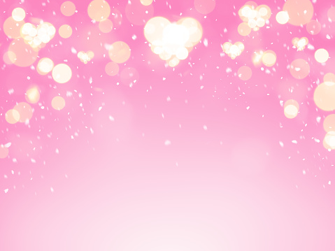 Pink blurred winter bokeh heart background. This file is cleaned and retouched.