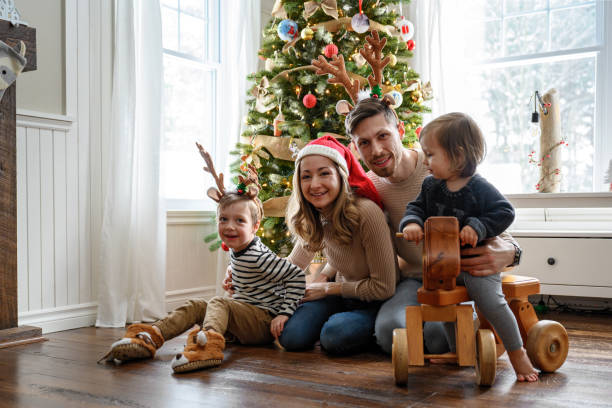 istock Family around the christmas tree 1446906508