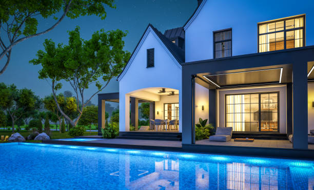 istock 3d rendering of white and black modern Tudor house in night 1446912086