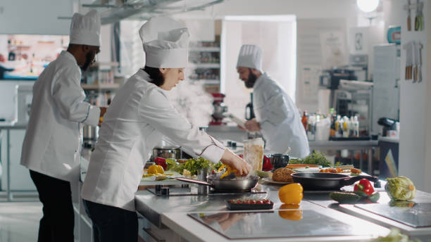 istock Professional chef preparing bell pepper ingredient on cutting board 1446913912