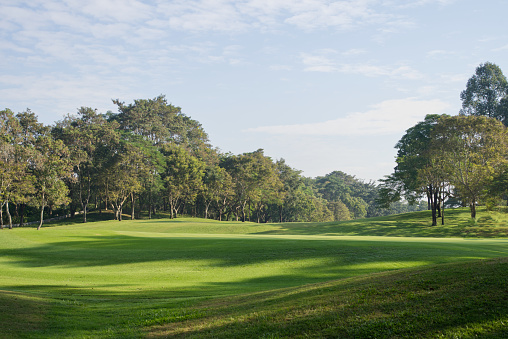 The beauty of the golf course is illuminated in the morning light.