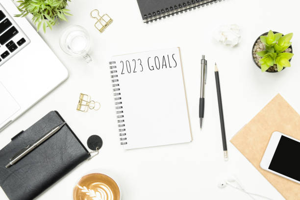 istock Notebook with 2023 goals text on it to apply new year resolutions and plan. 1446916564