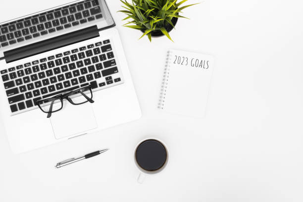 istock Notebook with 2023 goals text on it to apply new year resolutions and plan. 1446916659