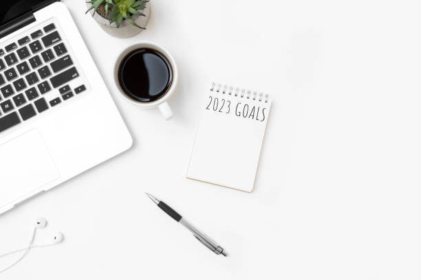 istock Notebook with 2023 goals text on it to apply new year resolutions and plan. 1446916684