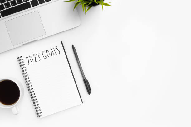 istock Notebook with 2023 goals text on it to apply new year resolutions and plan. 1446916703