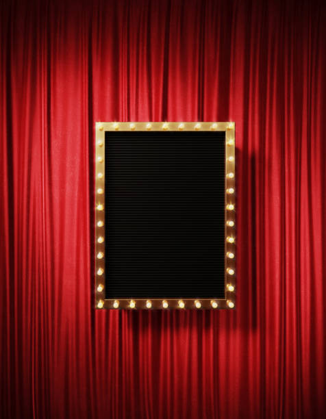 istock Black Retro Signboard With Glowing Lightbulbs On Red Curtain 1446918076