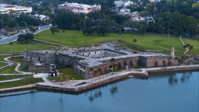 Castillo de San Marcos National Monument - the historic ancient Spanish fortress, the major tourist attraction and landmark in Saint Augustine, Florida. Aerial video with the slow panning camera motion.