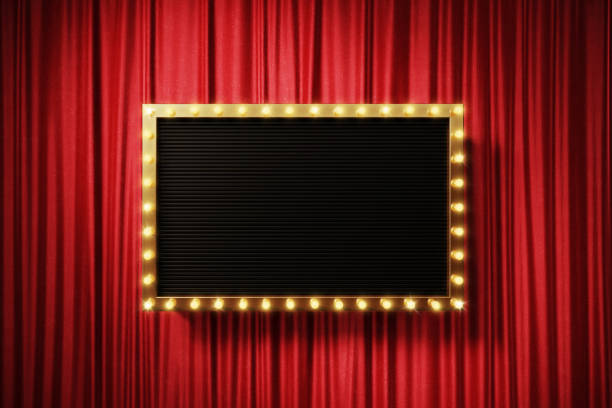 istock Black Retro Signboard With Glowing Lightbulbs On Red Curtain 1446919770