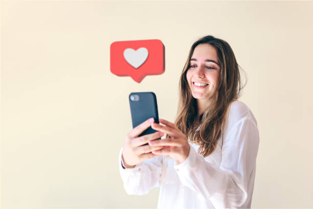 istock Happy young woman with smartphone using social networks app. 1446921165