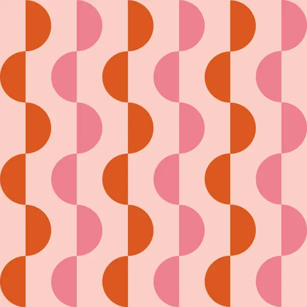 Vector illustration of Mid century modern abstract small orange and pink half circles seamless pattern.