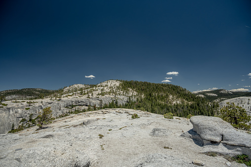 Deep blue sky over white granite of Yosemite National Park