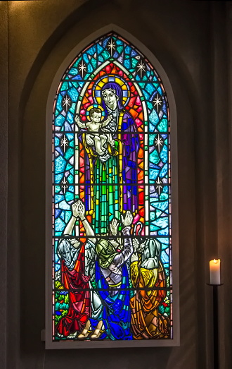 Holy Spirit stained glass in church