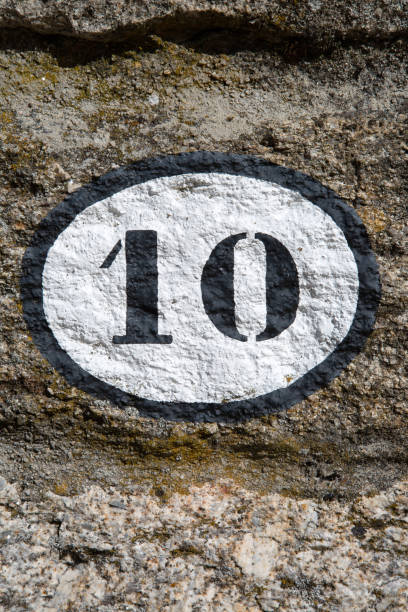 istock Black and White Number Ten on Stone Wall 1446925886
