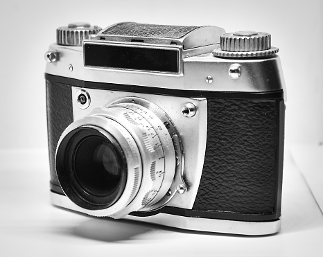 Vintage film camera isolated on white with a copy space