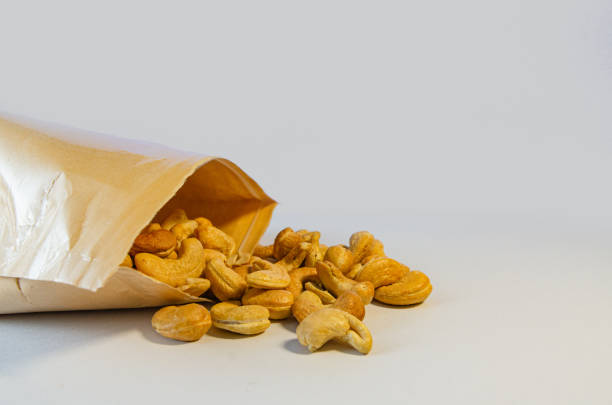 istock cashew nuts on a white background The lighting was filmed in the studio. 1446939508