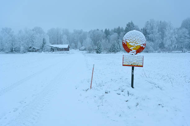 istock road signs covered in snow and undreadable 1446940304