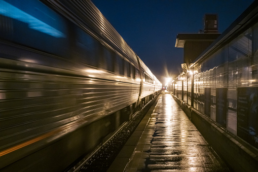 Passenger Train at Station waiting for Passengers at Night