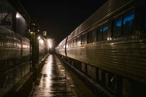 Passenger Train at Station waiting for Passengers at Night