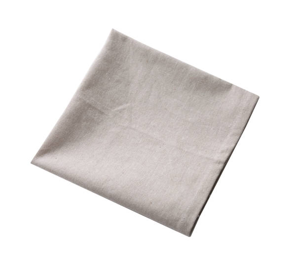istock Kitchen towel isolated on white. Folded cloth.Food serving design element. Square napkin. 1446942409