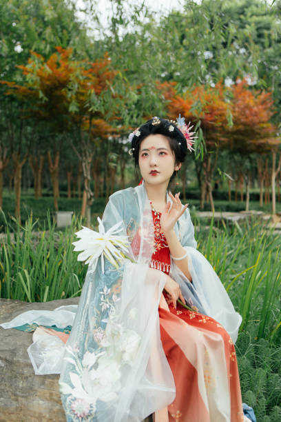 istock Asian Hanfu Beauty Taking Epiphyllum 1446946356