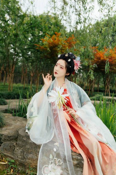 istock Asian Hanfu Beauty Taking Epiphyllum 1446946992