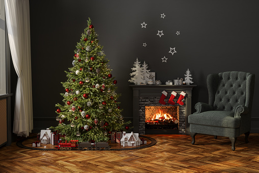 Modern Living Room With Christmas Tree, Miniature Train, Gift Boxes, Fireplace And Armchair