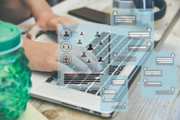 istock Live chat social network concept. Hands using mobile smartphone, chatting icons. Youth communication 1446953915