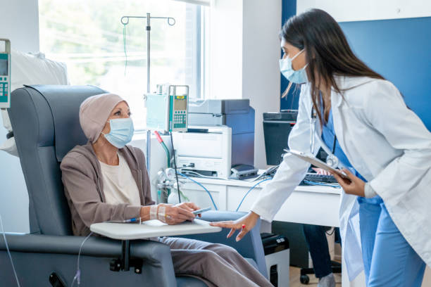 istock Chemotherapy patient discusses with her doctor 1446954400