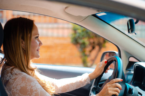 istock Woman driving inside the car 1446955190