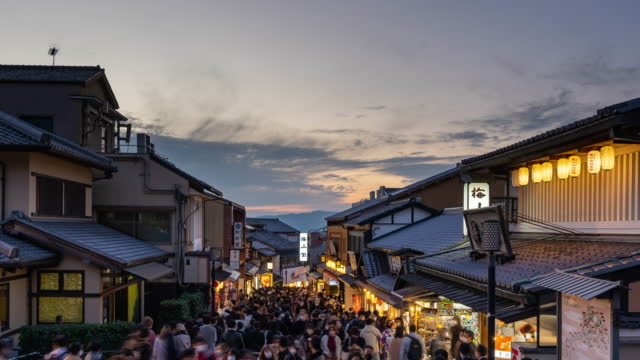 Timelapse : Crowd of people walking travel  at  Kiyomizuzaka road night market  in Kyoto