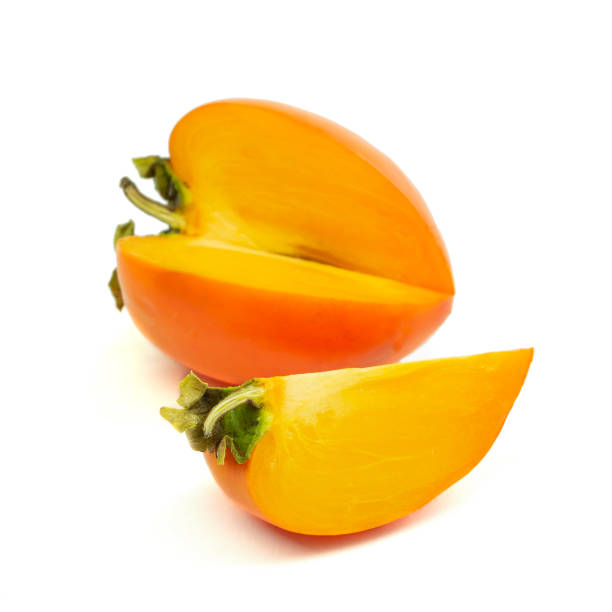 istock Persimmon fruit isolated on white background. Orange fresh ripe persimmon.Persimmon tree fruit, plant food, healthy diet 1446959964
