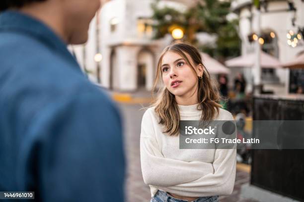 Young Couple Having An Argument Outdoors Stock Photo - Download Image Now - Couple - Relationship, Arguing, Relationship Breakup
