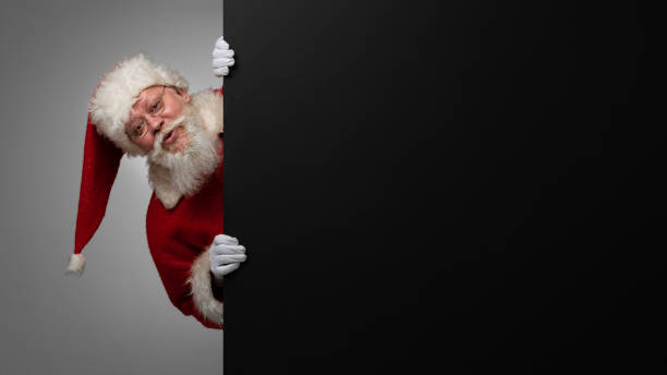 istock Santa Claus with black billboard 1446964481