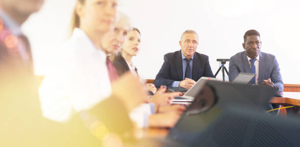 istock Group of business people discussing work plan in conference room 1446964601