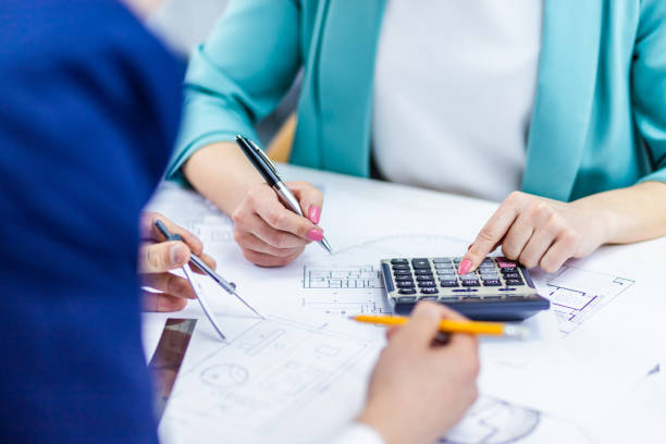 istock Close up photo of hands working with papers at office. 1446965547
