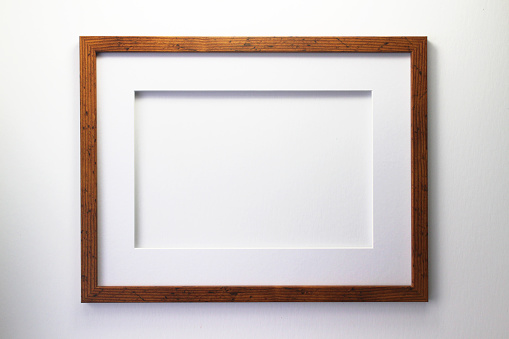 A wooden picture frame with room for your image.