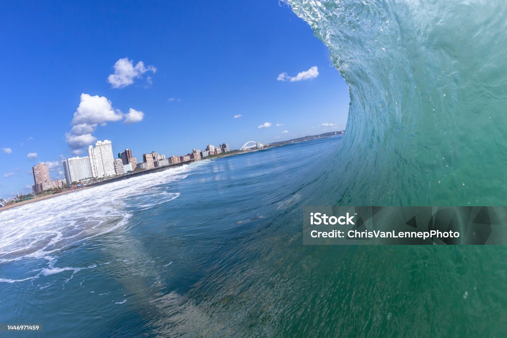 Durban Beachfront Ocean Swimming Wave Surfing Water Photo Durban beachfront swimming ocean wave water photography surfing  view of hotels, apartments a holiday coastline landscape. Apartment Stock Photo