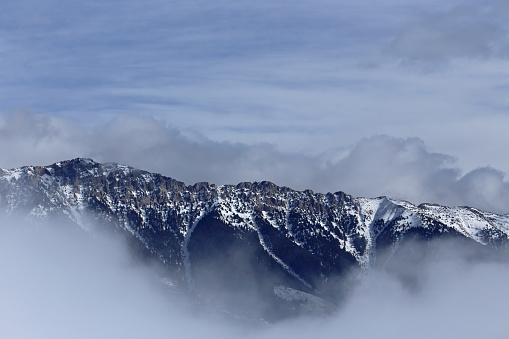 Cloud shrouded mountain ridge in the Lost River Range of Idaho.
