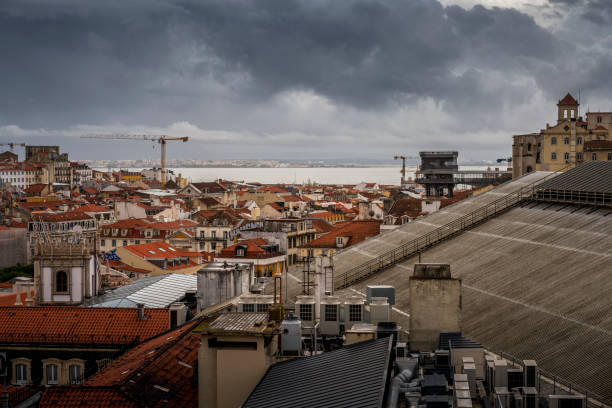 view over the rooftops of Lisbon. tagus river / tejo river in background