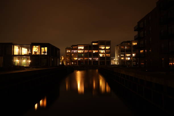 New construction on the waterfront on a late dark evening