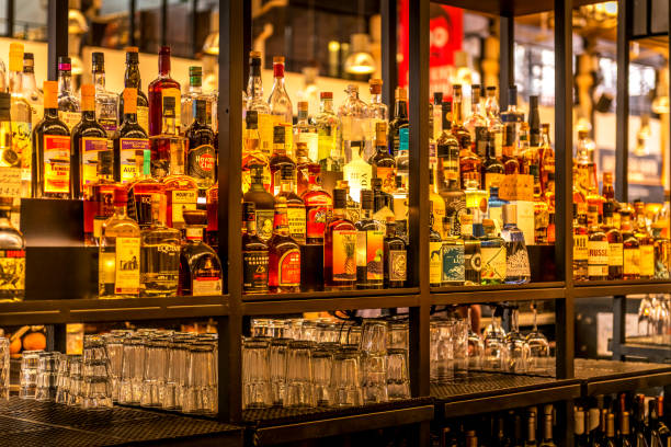 view to a lot of different alcohol bottles at a bar in Lisbon stock photo