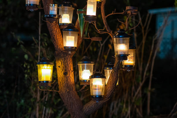 istock Memorial grave lights on all saints day. 1446979111