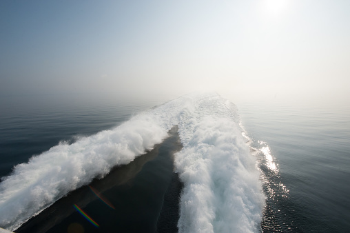 Wake of a fast ferry on calm sea