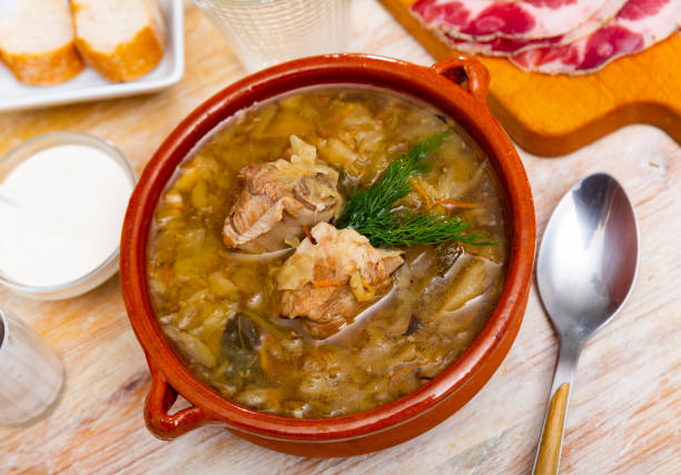 istock Traditional Russian dish is cabbage soup 1446979182