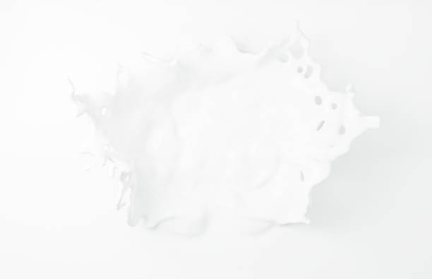 istock White Milk splash on clean background for mock up. Liquid white cream yogurt pouring. 3d rendering. 1446983423