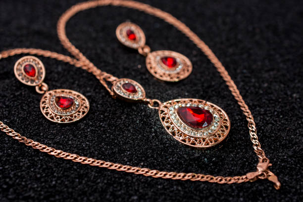 istock Set of golden set with diamonds over black background 1446985117
