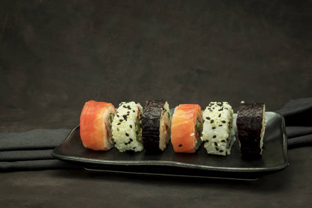 istock A set of delicious sushi on dark background 1446986675