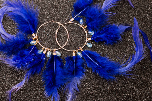 istock A pair of womens earrings isolated on background 1446986820