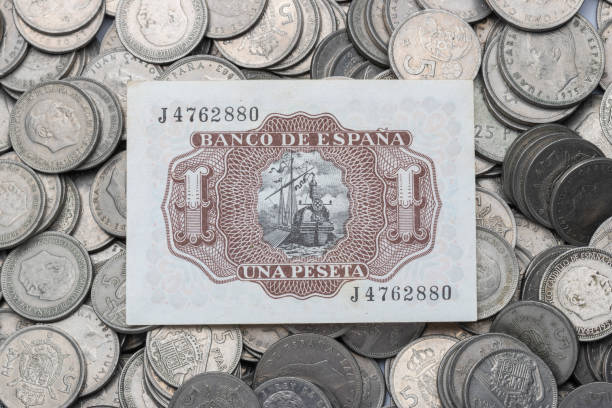 istock One peseta bill on Spanish coins 1446989925