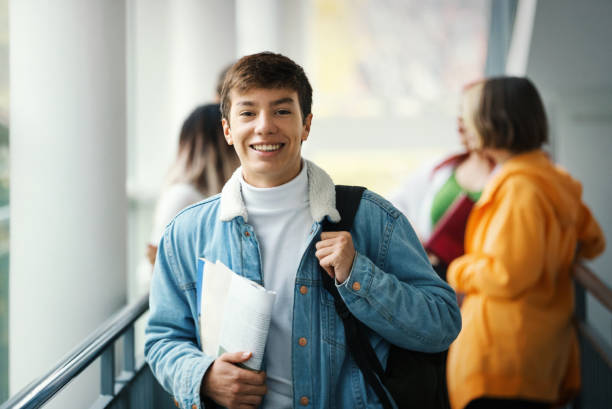 istock Highschool students on a break in  the hallway. 1446998988